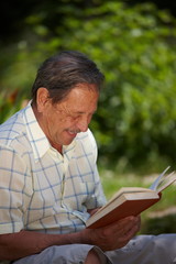 Fototapeta premium Happy senior man reading