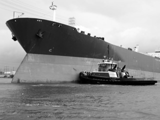 ship and tugboat