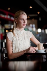 Woman In Cafe