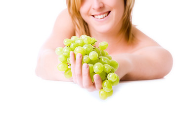 Hand with grapes