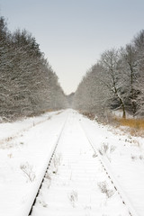 Obraz premium snow and railway with pale blue sky