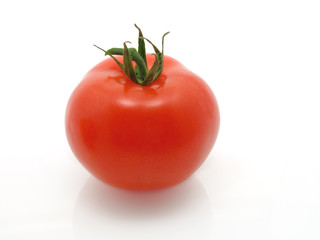 Red tomato isolated on white background.