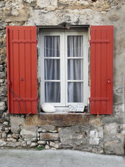 Window with red shutters