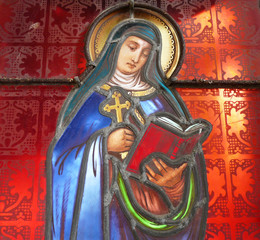Stained glass window with an image of Saint Louise