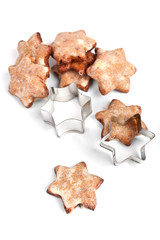 star-shaped homemade christmas cookies with a cookie-form