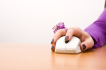 hand with a mouse device