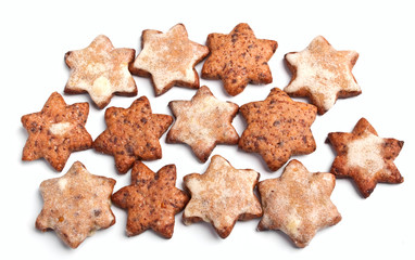 a group of star-shaped homemade christmas cookies - Powered by Adobe