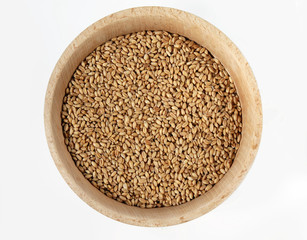 Wheat in wooden bowl