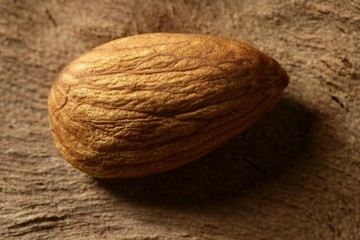 Almond macro over wood background