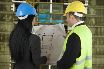 Engineer and buyer with project on site