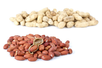 Shelled roasted peanuts and some husk
