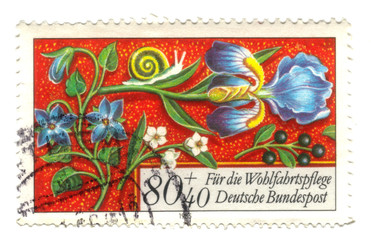 Old canceled german stamp with flowers