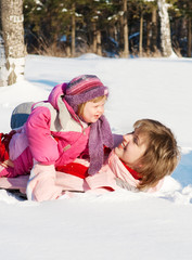 Obraz premium Mother playing with baby