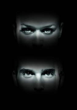 Close up woman and man face in dark background