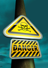 Danger skull sign against the sky