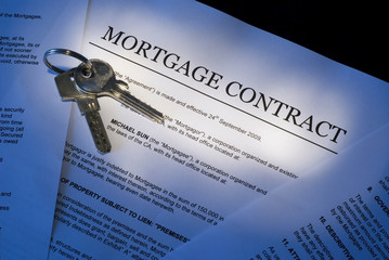 Mortgage contract with house keys