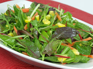Baby greens dressed with olive oil