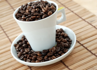 Cup with coffee beans