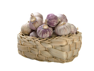 Garlic in basket on white background