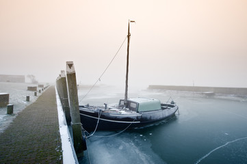 sailing boat on a cold day in winter