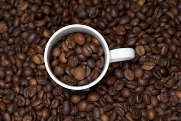 background with white cup and coffee beans