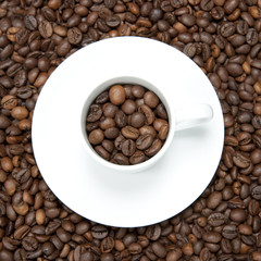 background with white cup and coffee beans