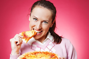 happy girl eating pizza