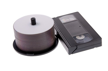 Heap of plates DVD or CD and VHS tape on white background