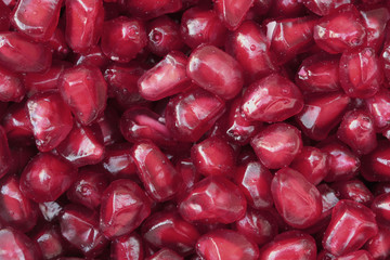 background filled with pomegranate seeds