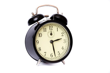 Vintage  clock with alarm bells  on white background