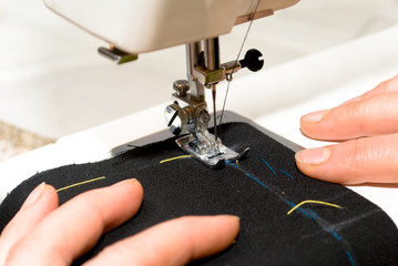 Hand sewing on a machine