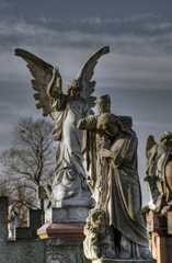 Fototapeta premium Angle and Cross at Rock / Church Cemetery Nottingham