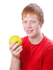 redhead teenager  wit green apple