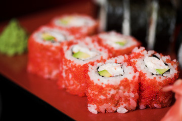 Rolls with salmon, crab and avocado