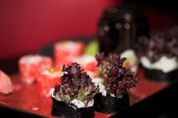 Rolls with salmon, crab and avocado