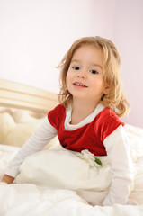 Fototapeta premium Child on the bed