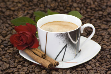 cup of coffee, rose and cinnamon