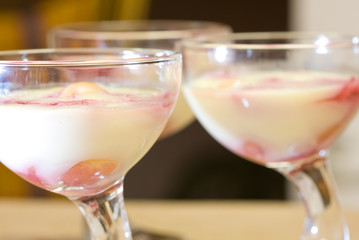 Strawberries with cream in cup