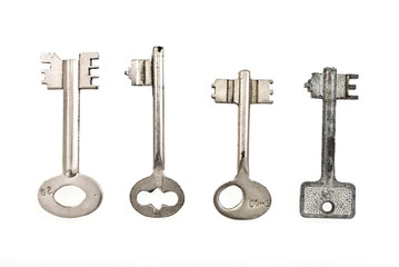 set of old keys isolated on white background