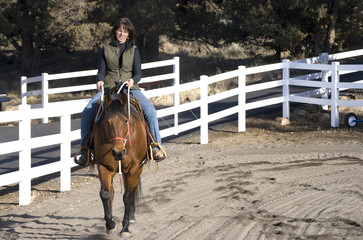 Woman Riding a Bay Horse