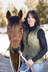 Attractive Dark Haired Woman and Pretty Bay Horse Portrait