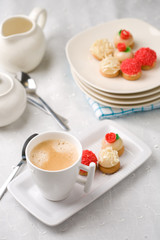 Cup of coffee with treats