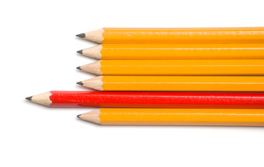 Fototapeta premium Yellow and red pencils point left