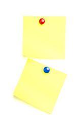 2 Post it notes with drawing pins.
