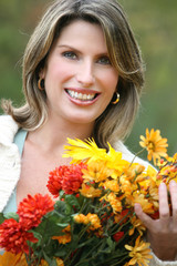Naklejka premium Woman in a Park, Fall, Seasonal Theme