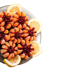 beautiful still life of tangerine stuffed with pomegranate seeds