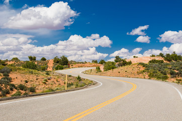 vibrant image of highway and blue sky