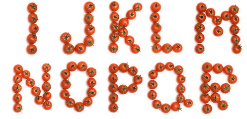 Letters of English alphabet formed from tomatoes