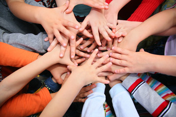 Children have combined hands together