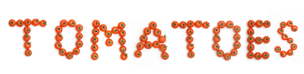 Inscription "tomatoes" performed from cherry tomatoes